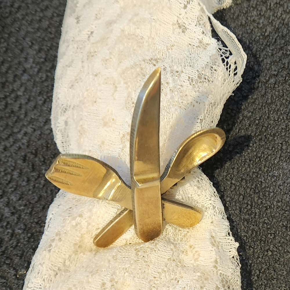 4 Vintage brass fork, knife, spoon napkin rings